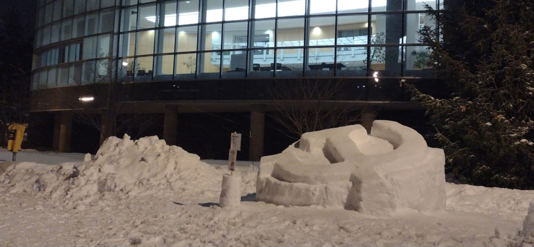 picture of a statue of a hammer and sickle made of snow